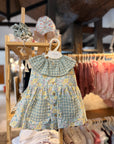 Vestido com tapa fraldas