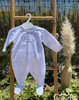 Babygrow branco com pintas cinzas