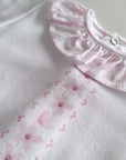 Babygrow estampado flores rosa