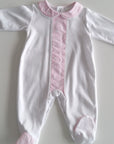 Babygrow branco com lista rosa