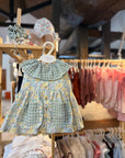 Vestido com tapa fraldas