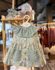 Vestido com tapa fraldas