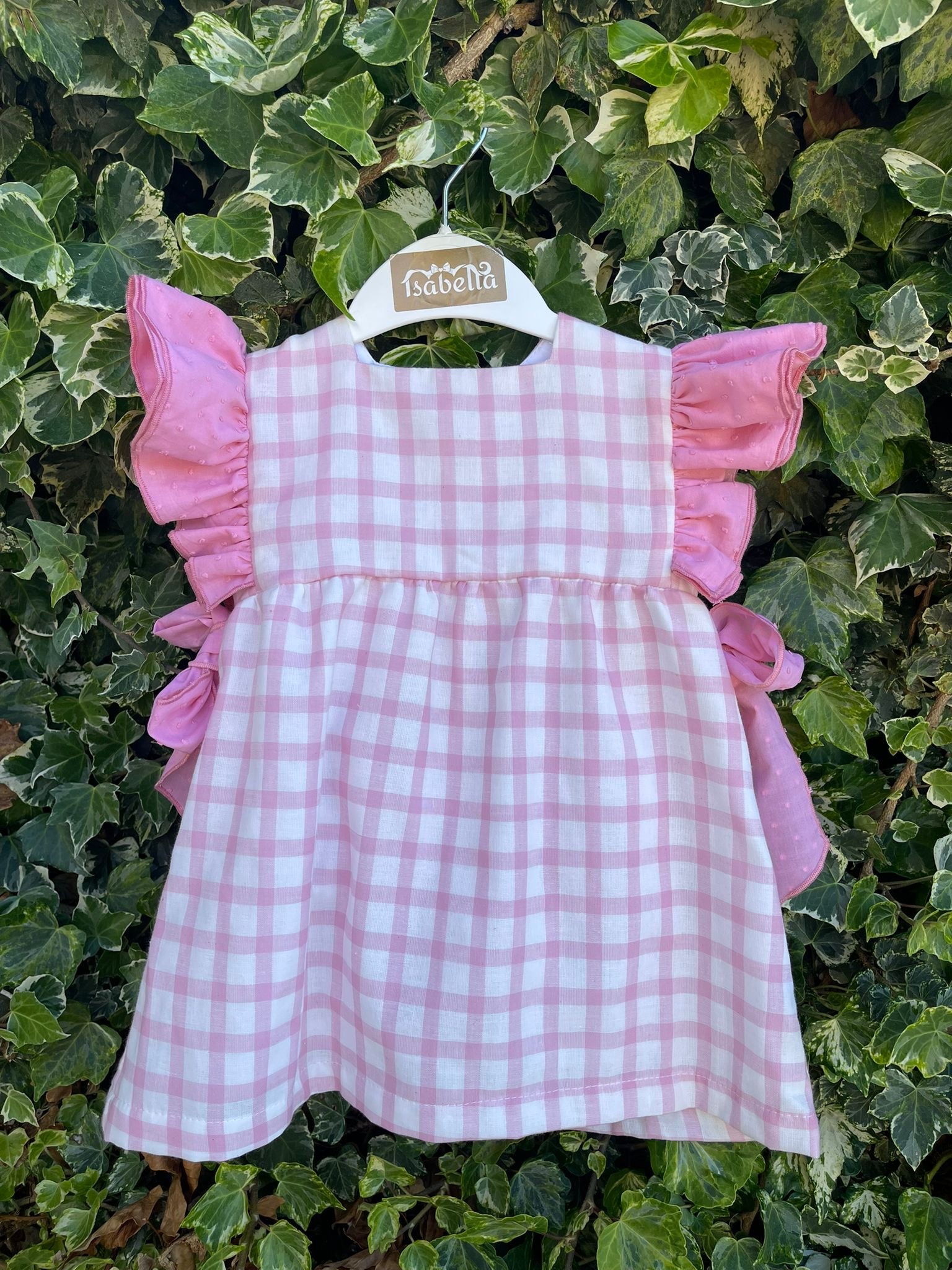 Vestido vichy rosa com tapa fraldas